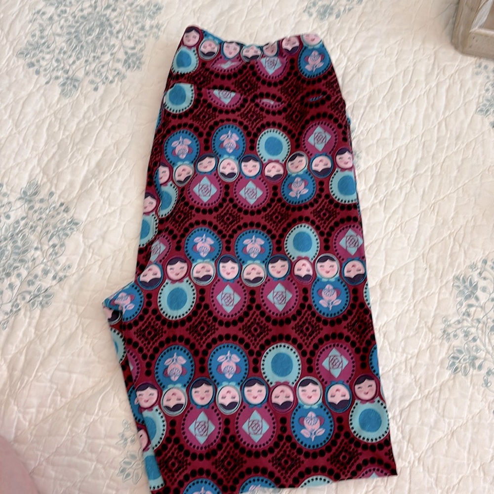 Lularoe tall and curvy leggings with Russian nesting doll pattern.
